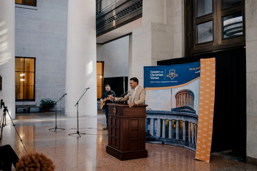 The podium and the guitar, before the chairs fill