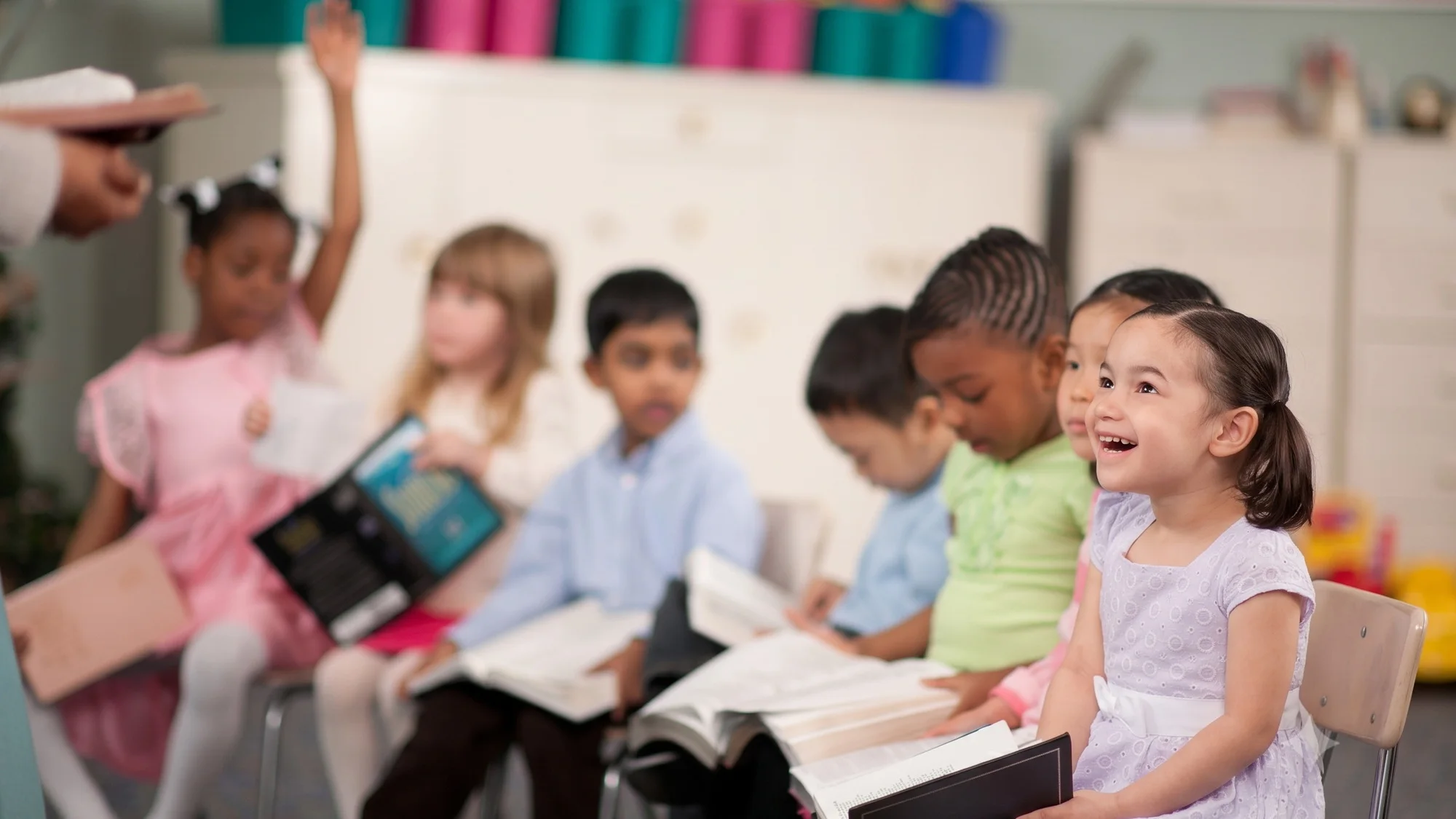 Children reading Bibles in a Christian school classroom